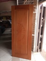 Single Panel Wooden Door With Sunburst Design