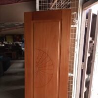 Single Panel Wooden Door With Sunburst Design